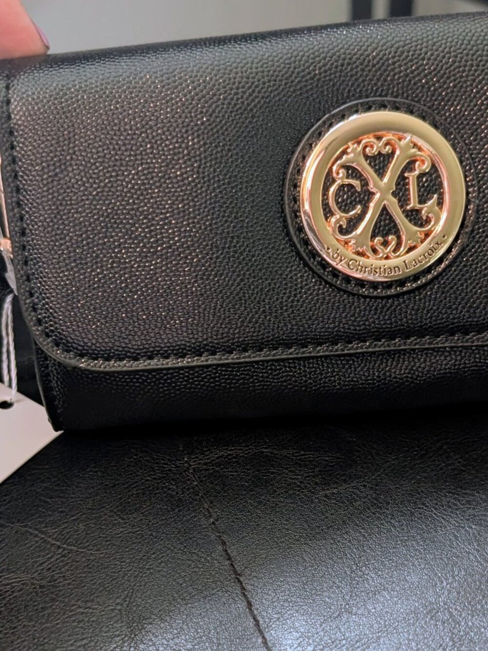 NWT CXL Bali black wristlet clutch. Christian Lacroix
